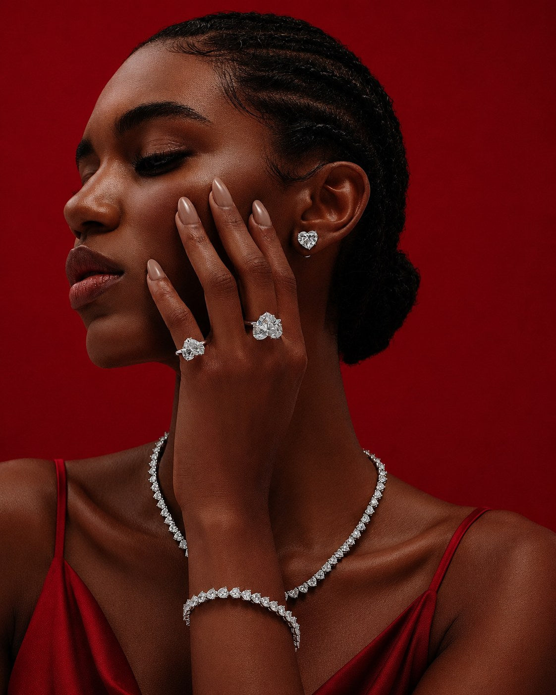 Model wearing diamond earrings, rings, necklace and bracelet